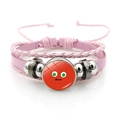 Detail of pink layered braided leather bracelet with quirky emoji glass cabochon charm - Red Base Green Eye Shock (Style-3) / Pink