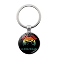 Porte-clés Pew Pew Madafakas avec chat noir armé sur fond de soleil couchant rétro - Argent-Chat Pointant (Argent-2)