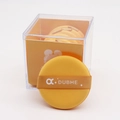 Detail of soft orange cosmetic puffs with ribbon handle in transparent acrylic storage box - Round Sponges And Storage Box / Orange Yellow