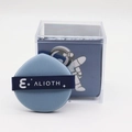 Close-up of a blue makeup puff with ALIOTH ribbon and its transparent astronaut-themed box - Dark Blue Sponges And Storage Box / Dark Blue