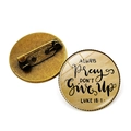 Detail of vintage copper brooch with Bible verse engraving Always Pray Don't Give Up - Luke 18:1 / Bronze