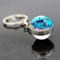 Close-up of double-sided glass ball keychain with ocean orca family and coral reef illustration - Orca Family Coral Reef Style (JY9534-7)