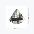Detail view of houndstooth triangular powder puff showing 67mm by 62mm dimensions - L Triangular Shape / Box Packaging