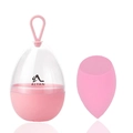 Détail de l'éponge à maquillage rose avec boîte de rangement en forme d'œuf et cordon - Forme de Coupe Biseautée / Rose