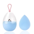 Close-up of sky blue teardrop makeup sponge in a portable egg-shaped hanging case - Teardrop / Blue