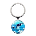 Detailed close-up of a silver keychain featuring a round glass orca whale ocean pendant - Orca Leaping Blue Ocean Style(JY9532-12)