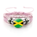 Detail of pink woven leather bracelet with Jamaica flag glass cabochon charm - Jamaica Flag / Pink