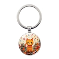 Primer plano de un llavero redondo plateado con un diseño de gato abstracto y colorido - Estilo Gato Naranja Lindo Floral (JY9600-10)