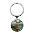 Detailed close-up of artistic owl glass dome pendant on a silver metal keychain - Night Moon Village Owl (JY9604-10)