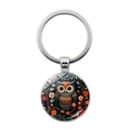 Macro view of artistic owl illustration under glass on silver metal keychain pendant - Artistic Painted Owl (JY9604-9)