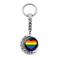 Silberner Schlüsselanhänger mit drehbarem Regenbogenherz und hohlem Monddesign - Rainbow Heart on Black