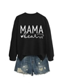 Detail of MAMA BEAR print on black crewneck sweatshirt paired with ripped denim shorts - Black (White Font)
