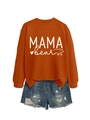 Detail of MAMA BEAR print on orange sweatshirt paired with blue distressed denim shorts - Burnt Orange (White Font)