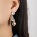 Elegant gold titanium earrings with teardrop faux pearl and brown resin drop on model - Steel Tone Clear Resin (F1119-Steel Tone Clear Resin Earrings)
