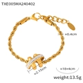 Gold rope chain bracelet with a sparkling crystal-encrusted crossover center piece - Gold Bracelet (TXE005)