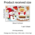 Detail view of Santa and Snowman window stickers with size dimensions for decoration - Santa in Chimney and Snowman Style (DJ3024D-YL)