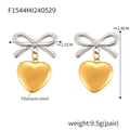 Pendientes de lazo plateado y corazón dorado de acero de titanio con medidas detalladas - Lazo Plateado Corazón Dorado
