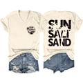 Front and back detail of beige V-neck cotton T-shirt with Sun Salt Sand tropical palm tree print - S / Sand