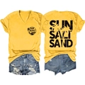 Detail of yellow V-neck Sun Salt Sand T-shirt with palm trees and denim shorts - S / Yellow