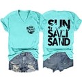 Dettaglio della maglietta verde menta con scollo a V e stampa e shorts in denim - XL / Blu scuro