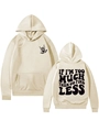 Detail of beige oversized hoodie with IF I'M TOO MUCH THEN GO FIND LESS text and pocket - Sand