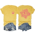 Macro detail of tropical yellow T-shirt with pink hibiscus and starfish print on back - Yellow
