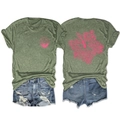 Flat lay of olive green T-shirt with pink hibiscus print and distressed denim shorts - Olive Green