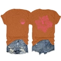Detail of terracotta t-shirt back with pink hibiscus floral graphic and front shell print - Burnt Orange