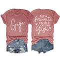 Front and back detail of brick red Gigi t-shirt and ripped denim shorts set - Rose Gold (White Graphic)
