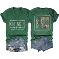 Flat lay of green V-neck T-shirt with kindness slogan and ripped denim shorts - S / Vintage Green