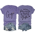 Flat lay detail of Gigi printed purple T-shirt and distressed denim shorts set - Purple (Black Graphic)