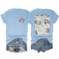 Flat lay of light blue t-shirt with floral print and Motherhood is Kingdom slogan on back - S / Light Blue