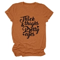 Close-up of rust orange cotton T-shirt featuring Thick & Thighs Pretty Eyes lettering - S / Burnt Orange