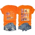 Détail de l'imprimé Sun Salt Sand sur T-shirt orange et short en jean vieilli - Orange