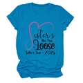 Close-up of sky blue round neck T-shirt with 2025 Sisters On The Loose print - S / Tops / Lake Blue