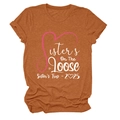 Detailed flat lay of a caramel brown t-shirt featuring Sister's On The Loose graphic design - S / Tops / Burnt Orange (White Text)