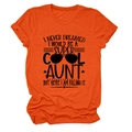 Detail of bright orange cotton T-shirt featuring black artistic text and sunglasses graphic - Orange (Black Font)