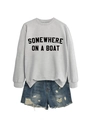 Flat lay of gray crewneck sweatshirt with black 'SOMEWHERE ON A BOAT' print and denim shorts - Grey (Black Font)