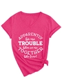 Detail of magenta V-neck T-shirt with white text print and stylish knotted hem design - Rose Red (White Font)