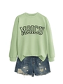 Flat lay of light green MSICU sweatshirt paired with distressed blue denim shorts - Olive Green (Black Font)