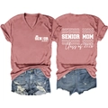 Detailed front and back views of the V-neck Senior Mom 2026 T-shirt in dusty pink - Rose Gold (White Font Print)