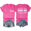 Detail of the Senior 2026 Mom pink V-neck t-shirt with graduation print and denim shorts - Rose Red (White Font Print)