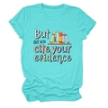 Detail of turquoise cotton T-shirt featuring academic text and colorful book graphics - Deep Water Blue