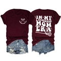 Front and back view of burgundy Lacrosse Mom Era t-shirt with sports graphic and denim shorts - Wine Red (White Print)
