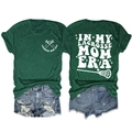 Detailed flat lay of Lacrosse Mom Era t-shirt back with graphic and denim shorts - Vintage Green (White Print)