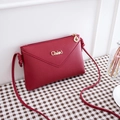 Dark red envelope-style crossbody phone bag with lychee texture and golden logo - Red
