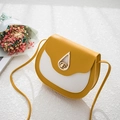 Contrast saddle bag in ginger yellow and off-white with golden teardrop lock - Yellow