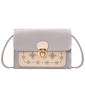 Mini crossbody bag in grey-purple and beige with hollowed-out floral pattern and gold lock - Light Gray