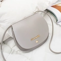 Minimalist grey faux leather saddle bag with gold logo and shoulder strap - Gray