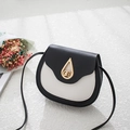 Classic black and white saddle bag with golden teardrop twist lock and slim strap - Black